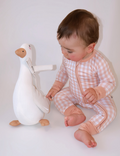 Baby wearing the Goodnight Goose peach gingham bamboo zippie with a two-way zipper and fold-over feet.