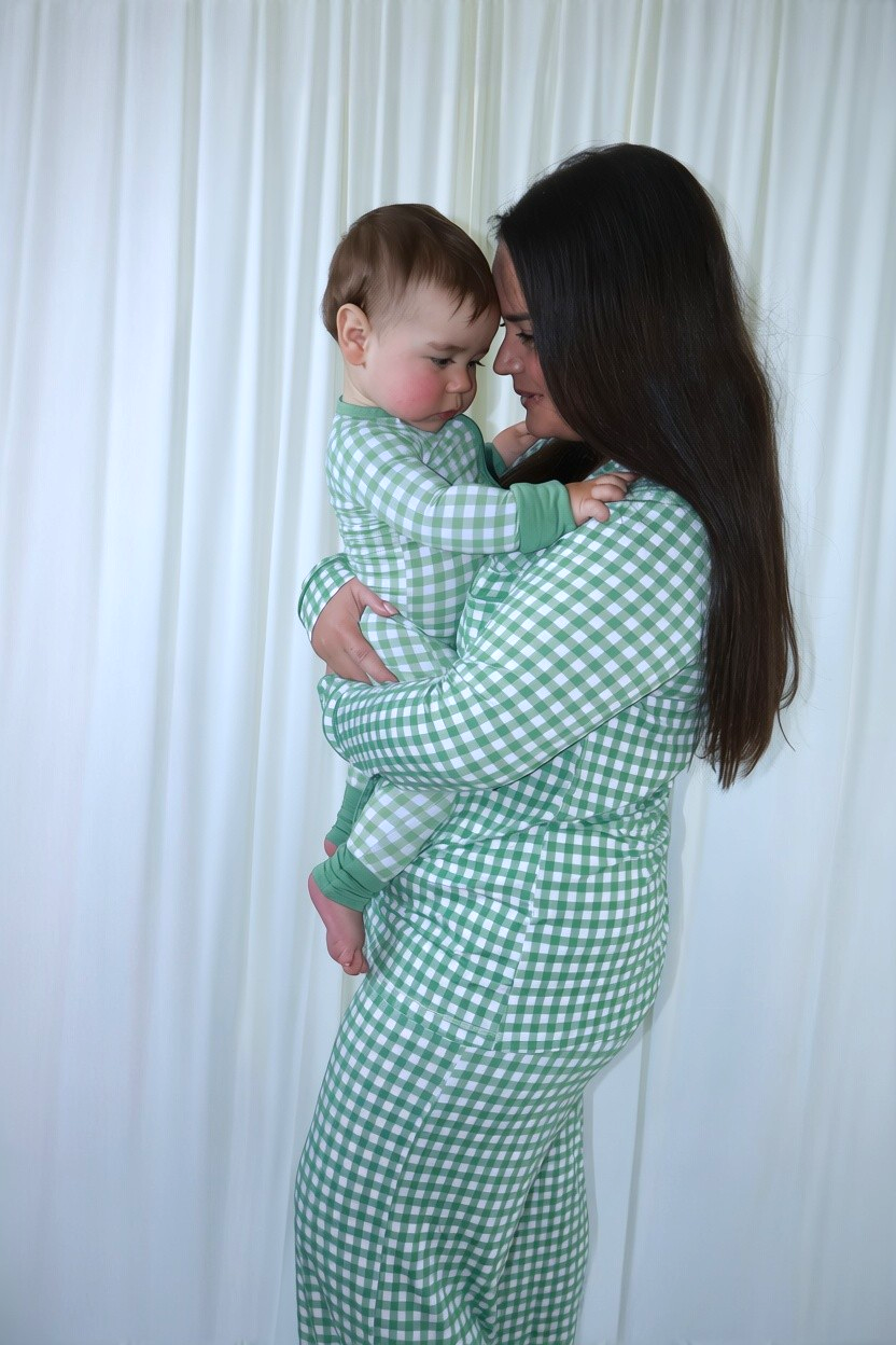 Woman wearing the Goodnight Goose green gingham women's bamboo pajama set.